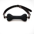 Black bone-shaped silicone mouthpiece with adjustable black PU strap