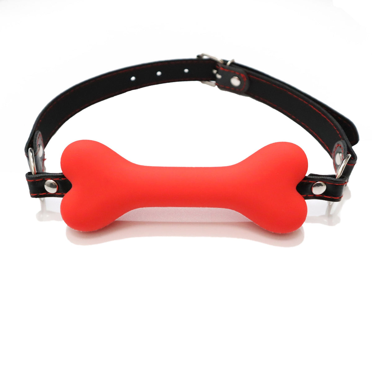 Red bone-shaped silicone mouthpiece with adjustable black PU strap